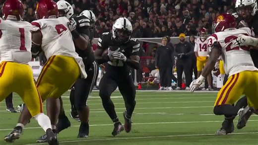 Nebraska's Johnson hits the gap and scores vs. USC