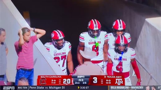 Wild moment as an officer at the Texas A&M, USC game throws an elbow into Nyck Harbor and company after the 80 yard touchdown. | Famously Garnet Sports
