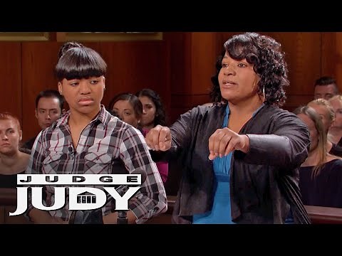 Woman Claims Neighbor's Dog Jumped the Fence