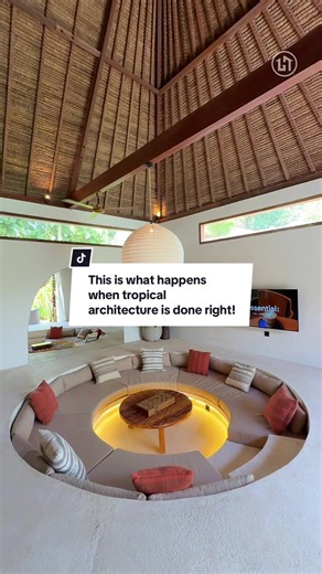 Designed with a strong connection between water, light, and natural materials, this home embraces a true indoor–outdoor lifestyle. The thatched roof isn’t just aesthetic, it provides natural insulation, keeping interiors cool while adding a timeless tropical character. Floor-to-ceiling timber-framed glass doors line the pool, allowing every room to open directly onto the water and greenery. The long linear pool acts as the spine of the design, visually stretching the space and reflecting light d