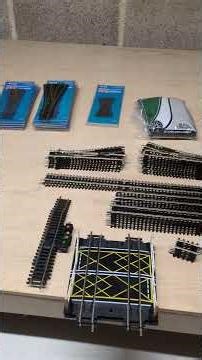 Track stock take in the garage with the big model railway board