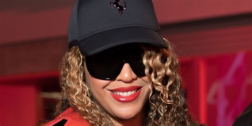 Beyoncé Goes Pantsless in a Plunging Red Hot Leather Bodysuit for an F1 Date Night With Jay-Z