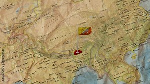 Bhutan's Map with Flag Unveiled.Flying the Bhutan Flag Above the Map.