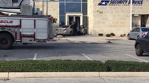 Two customers injured after woman crashes car into Security Service Federal Credit Union