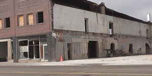 Two century-old buildings in process of being demolished