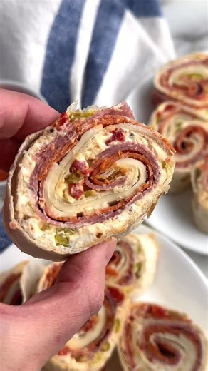 Heather Seeley on Instagram: "❤️ Italian Pinwheels Recipe❤️ Italian pinwheels are so full of amazing Italian sub flavor. Zesty cream cheese is combined with deli meat all rolled up in a tortilla. GET THE RECIPE: - Comment “RECIPE” and the link to the recipe will be sent to your DM’s. - OR tap the link in my bio Follow me @foodlovinfamily to be sure you are getting my DM’s 💟 https://www.foodlovinfamily.com/italian-pinwheels/ #italianpinwheels #pinwheelrecipe #easyappetizer #italiansub #easyappet