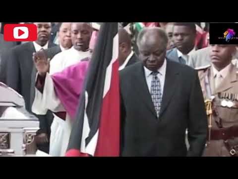 President Mwai Kibaki view the body of late Kijana Wamalwa at the Parliament building in 2003
