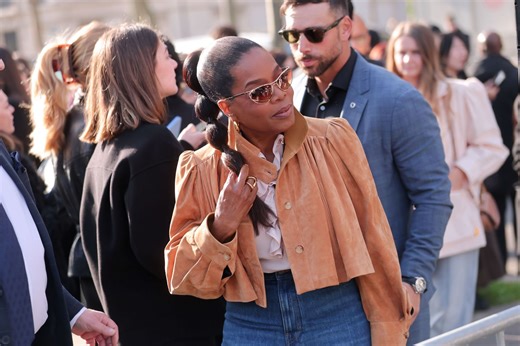 Why is Oprah Winfrey being subjected to Clone theories over her Paris Fashion Week appearance?