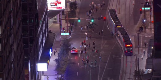 Dozens of deportation protesters march wrong way in downtown Phoenix