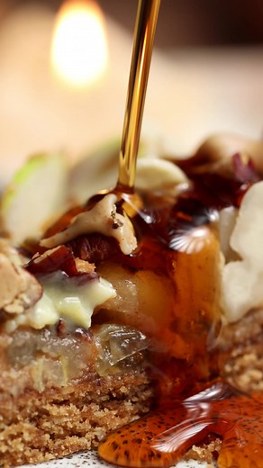 4K views · 6 comments | Introducing the cosy and delicious Apple Pie Cookie Pizza!  This delightful dessert features a baked cookie dough base, topped with spiced apples, toasted pecans, and a drizzle of peanut butter. Savour every bite of this warm and comforting treat! 殺 Full recipe here - https://www.grapetree.co.uk/blog/apple-pie-cookie-pizza | Grape Tree | Facebook