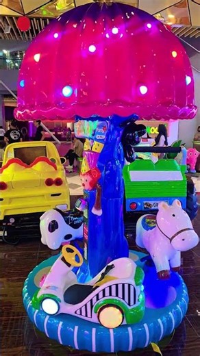 Horse carousel, spotted cow and flower car