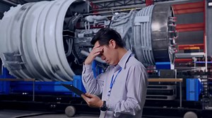 Engineer in a Factory Dealing with a Problem | Premium Stock Video Footage