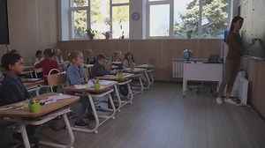 Boy answering a question in class - Free Stock Video