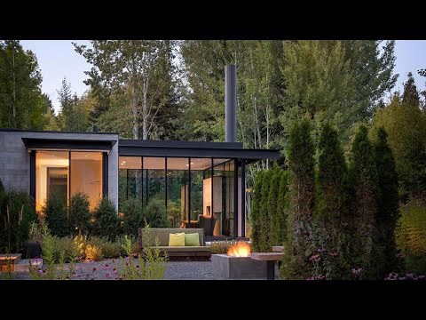 T-shaped House In The Middle Of The Mountainous Landscape