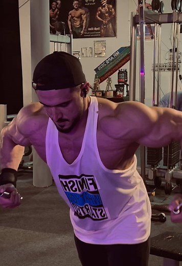 Muscular Workout Session at Sweat Station Gym