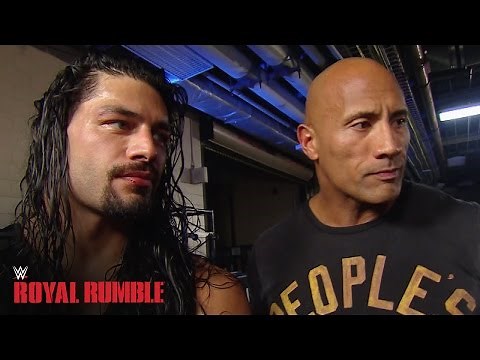 Roman Reigns celebrates with The Rock after winning the Royal Rumble Match - WWE Network