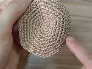 Cabeça da boneca amigurumi.