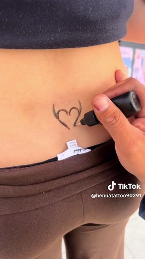 Henna Tattoo Designs for the Beach: Stylish Tramp Stamps