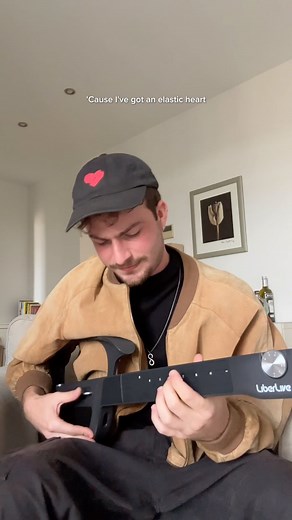 70K views · 188 reactions | Playing Sia’s Elastic Heart with the first stringless smart guitar - LiberLive C1 from @liberlive.official #liberlive #liberlivec1 #liberliveguitar #liberlivec1guitar #stringlessguitar #liberlivecover #singer #singing #cover #sia #elasticheart | Caio Klin | Facebook