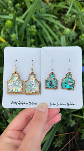 63 reactions · 4 comments | Cow tag earrings!!  The glitter and...