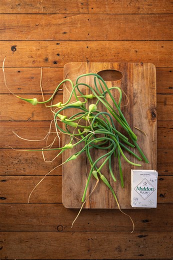 These are Lacto fermented Garlic scapes. Make sure you listen to the video with sound on. You will hear the wonderful sounds of fermentation! Lacto fermentation is a great way to keep things from going bad. It's a preservation method where bacteria convert sugars in food into lactic acid, creating a tangy flavour and stopping them from spoiling. But when you have a few too many things hanging around, and you're not sure what to do with them, this is an easy way to keep them for longer. You can u