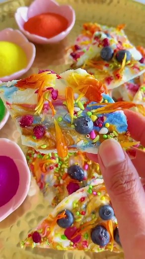 Vspiceroute celebrates Holi with colorful yogurt bark! 🌈🌈 Click here to see the full ingredient list and how-to on her profile: https://foodtv.com/3KUZ8aZ | Food Network