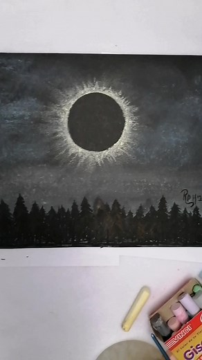 Dibujo fácil de un eclipse solar con gises de colores