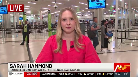 Passenger panics, opens plane door on taxiway at Atlanta airport, police say