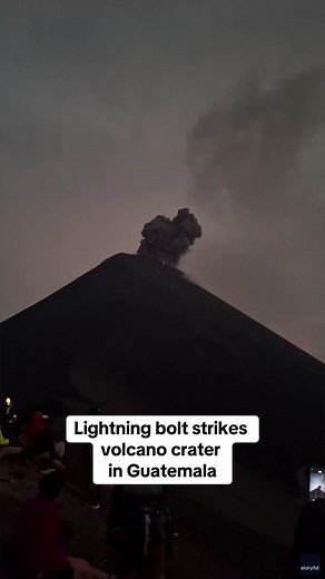 A lightning bolt struck an erupting volcano in Guatemala, wowing spectators who gathered to see the Volcan del Fuego. #volcano #guatemala