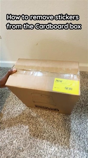 How to remove stickers/Lables from cardboard boxes without damaging
