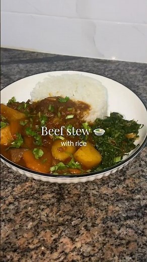 Beef stew 🍲 served with rice and greens.