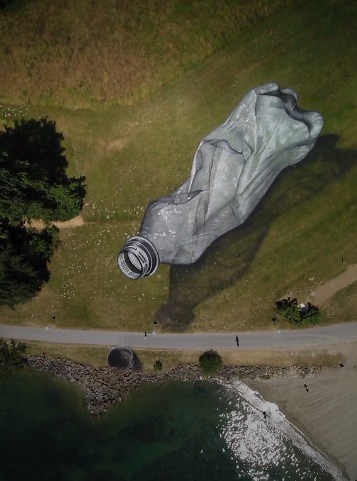 The latest huge artwork by @saype_artiste #art #streetart #artoftheday #visualart #bottle | Feel Desain