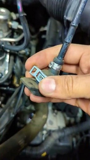 Ford EcoSport transmission fluid fell hole location.