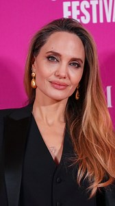 Angelina Jolie says playing Maria Callas in Pablo Larraín's "Maria" was a therapeutic experience that helped her find her voice again. | AP