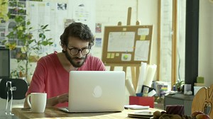 Man celebrating in front of the computer - Free Stock Video