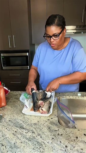 Stocking the fridge with fresh mackerel fish