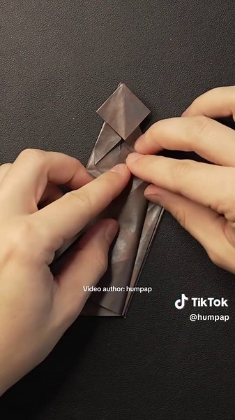 Paper carnotaurus, origami tutorial video. Video creator @humpap | origami
