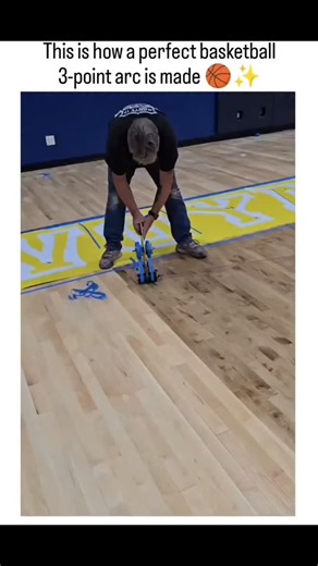 picpac2026 | Instagram showcases a wheeled tape dispenser, like the SportMaster Line Taping Machine, that pivots from the baseline to lay blue masking... | Instagram