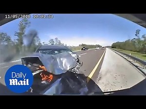 Terrifying dashcam video shows car slamming into police cruiser