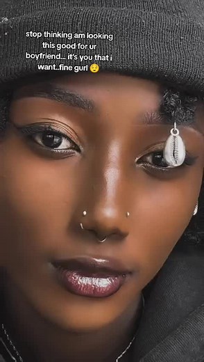 Expressive Style: Curly Hair and Bold Accessories