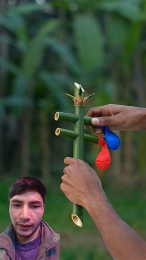 Creative balloon creations with two-tube bamboo slingshots! 🎈🌿
