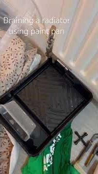 Bleeding central heating system to change a radiator valve. We used a paint pan to collect water