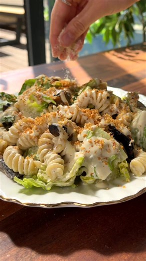 ALPHABETTI EP. 9: CAESAR PASTA SALAD 🥬🧄🍄 Technically grounds for dismissal, but completely worth it! Recipe on our website - search ’Caesar Pasta Salad’. New Twisted pasta every Wednesday - J guesses below 👀 #caesarpastasalad #alphabetti #pastasalad | Twisted Explore