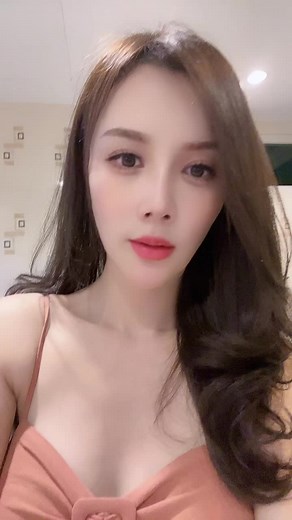 Stylish Peach Top with Bow Design: Fashion Inspiration