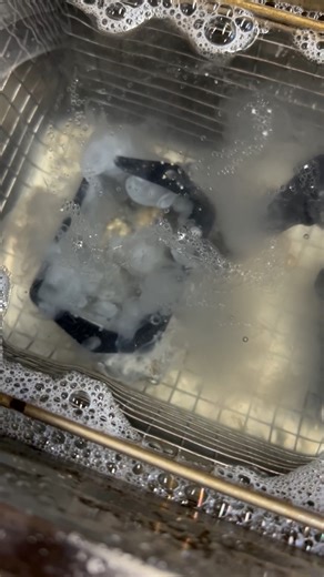 Crusty carb in the ultrasonic cleaner. | The Barn Brothers