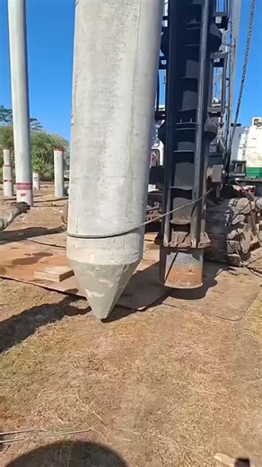 techy Universe on Instagram: "A heavy-duty pile driving operation in progress. The large hydraulic hammer is mounted vertically and is used to drive piles deep into the ground to create a strong foundation. The smoke or dust visible around the machine comes from the intense impact and friction generated during hammering. Such equipment is commonly used in bridge construction, marine works, high-rise buildings, and industrial foundations, where deep and stable support is required. The steel struc