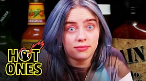 Watch Billie Eilish sweat through a spicy interview on 'Hot Ones'