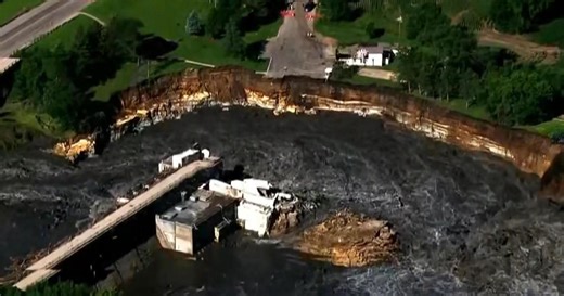 Side of Minnesota's Rapidan Dam eroded by raging floodwaters