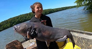 Hannah Barron Noodles a New Personal Best 61-Pound Blue Catfish in Freezing Waters