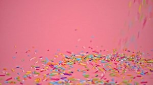 Colorful Sprinkles Falling On Pink Background Stock Footage Video (100% Royalty-free) 1025324912 | Shutterstock